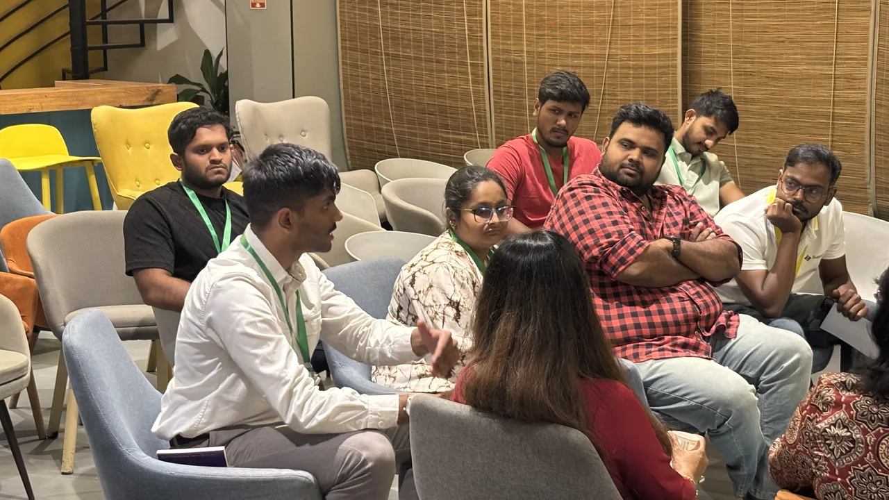A candid group deep in discussion at Circa Vol. 03, Chennai.